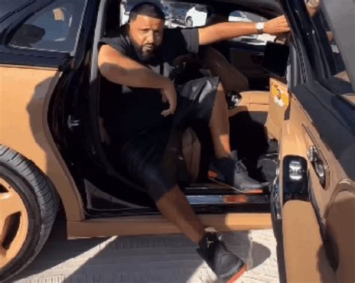 DJ Khaled gets security guards to CARRY HIM to stage to avoid getting sneakers dirty | Lifestyles