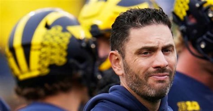 	Ex-football coach helped players cheat on the SAT, state panel says	