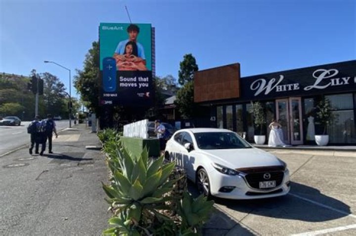 	HOT OR NOT? BILLBOARD BATTLE SPARKS LAWSUIT	
