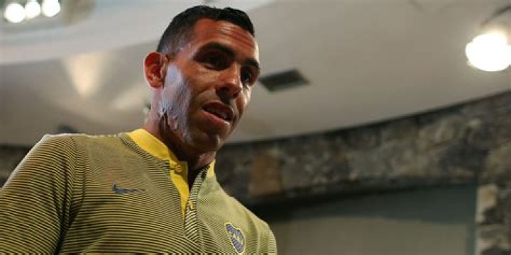 How did Carlos Tevez get a burn scar on his neck?