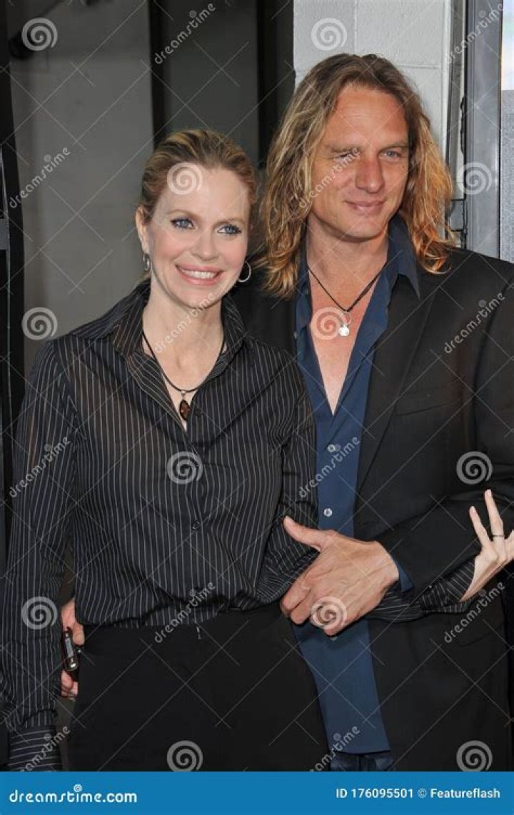 Kristin Bauer Van Straten and her husband Abri Van Straten having a smooth marriage