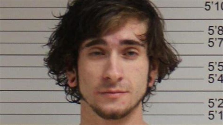 Man charged after crashing into CamTran bus stop, pulling knife, police say