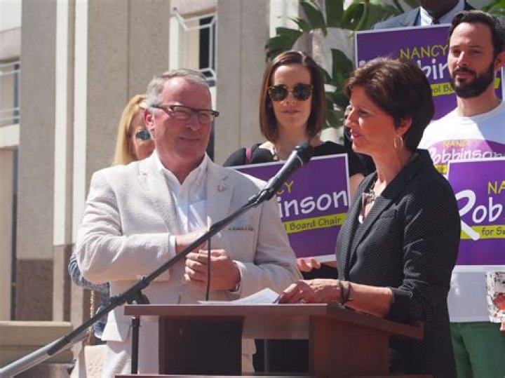 	Mayor Buddy Dyer endorses Nancy Robbinson in Orange school board chair race	