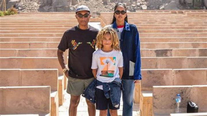 PHARRELL WILLIAMS, WIFE HELEN, AND SON ROCKET POSE IN RARE FAMILY PHOTO