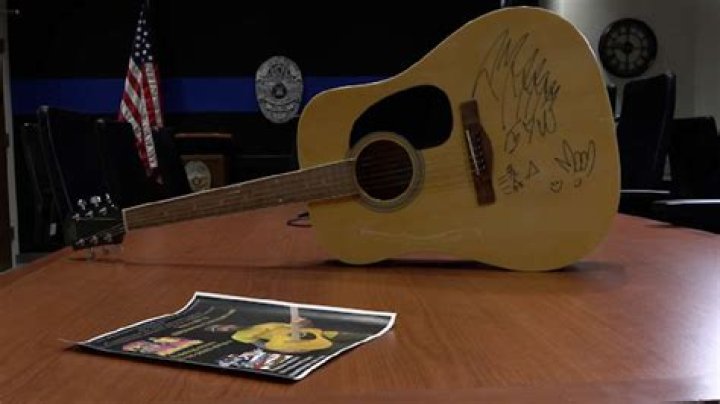 Post Malone offers 'Something Real' in signed guitar to raise money for Utah Honor Flight