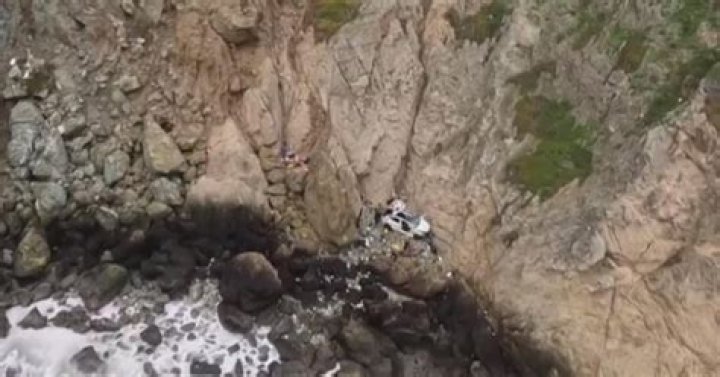 Tesla driver who drove family over Devil's Slide cliff charged with attempted murder