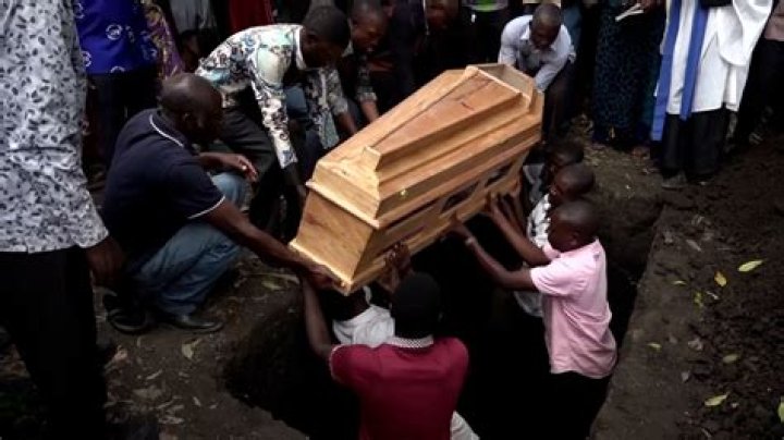 Uganda buries victims of massacre that left 42 dead, as president vows to hunt attackers ‘into extinction’