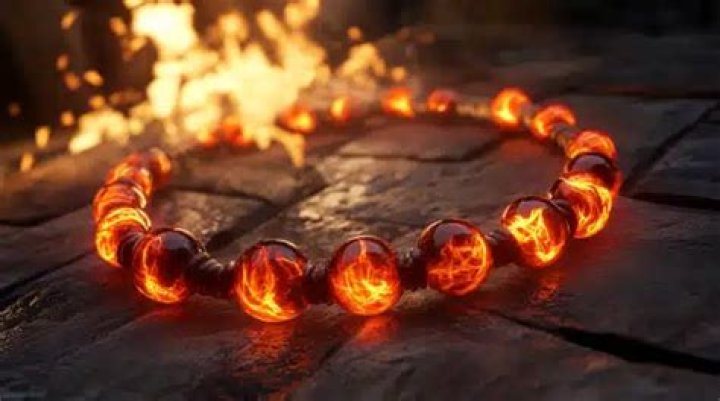 What happens when a necklace of fireballs detonates when worn?