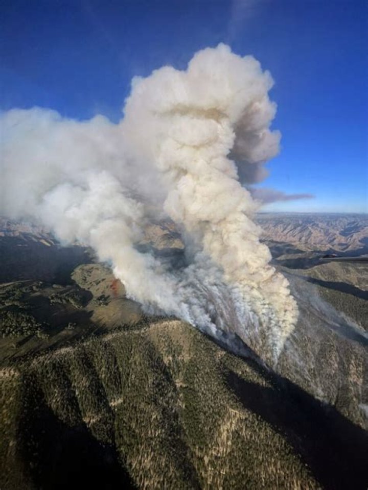 Wildfire grows by 400 acres in a day after fire embers from Lighthouse Canyon fire start another fire in Emery County